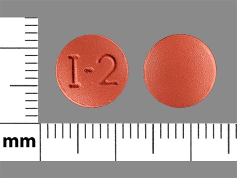 i 2 pill round brown